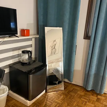 Suite Room Em Porto Alloggio in famiglia